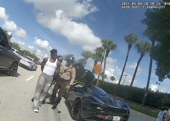 Tyreek Hill in handcuffs