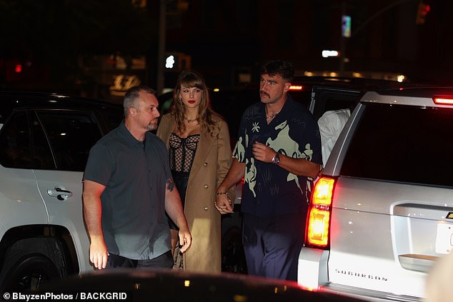 Taylor covered up in a long beige double-breasted coat as she strutted her stuff next to her Super Bowl winning beau