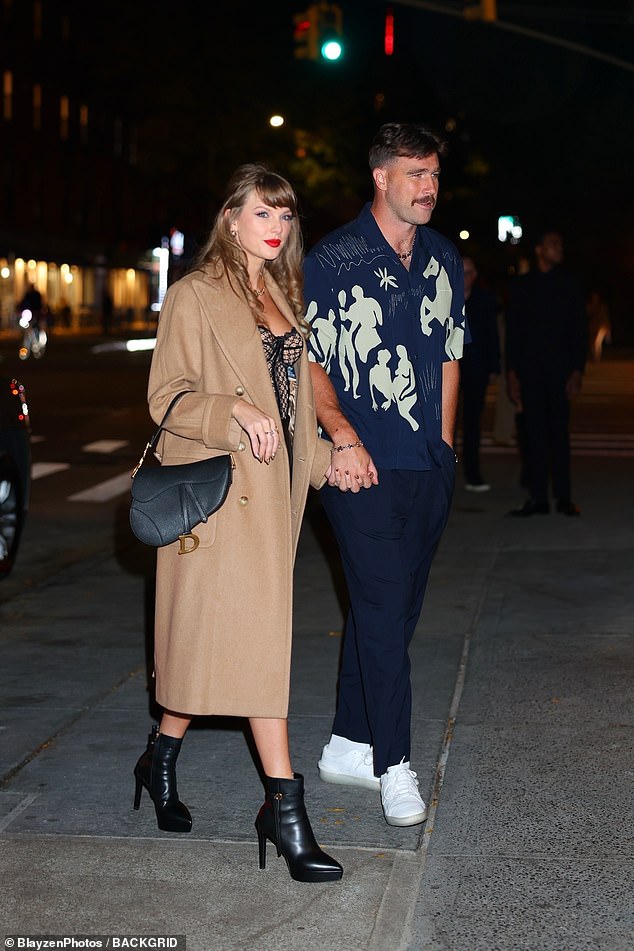 Taylor and Travis looked unbothered as they packed on the PDA as they strutted hand-in-hand to the hotspot after her Swifties ripped his ex Kayla Nicole for her recent tell-all interview