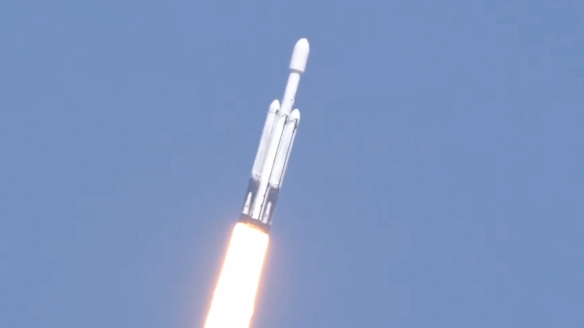 A triple-core SpaceX Falcon Heavy rocket launches NASA's Europa Clipper spacecraft toward Jupiter from Pad 39A of NASA's Kennedy Space Center on Oct. 14, 2024.