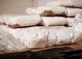 PF desarticula rede que exportava cocaína em sacas de café e cimento